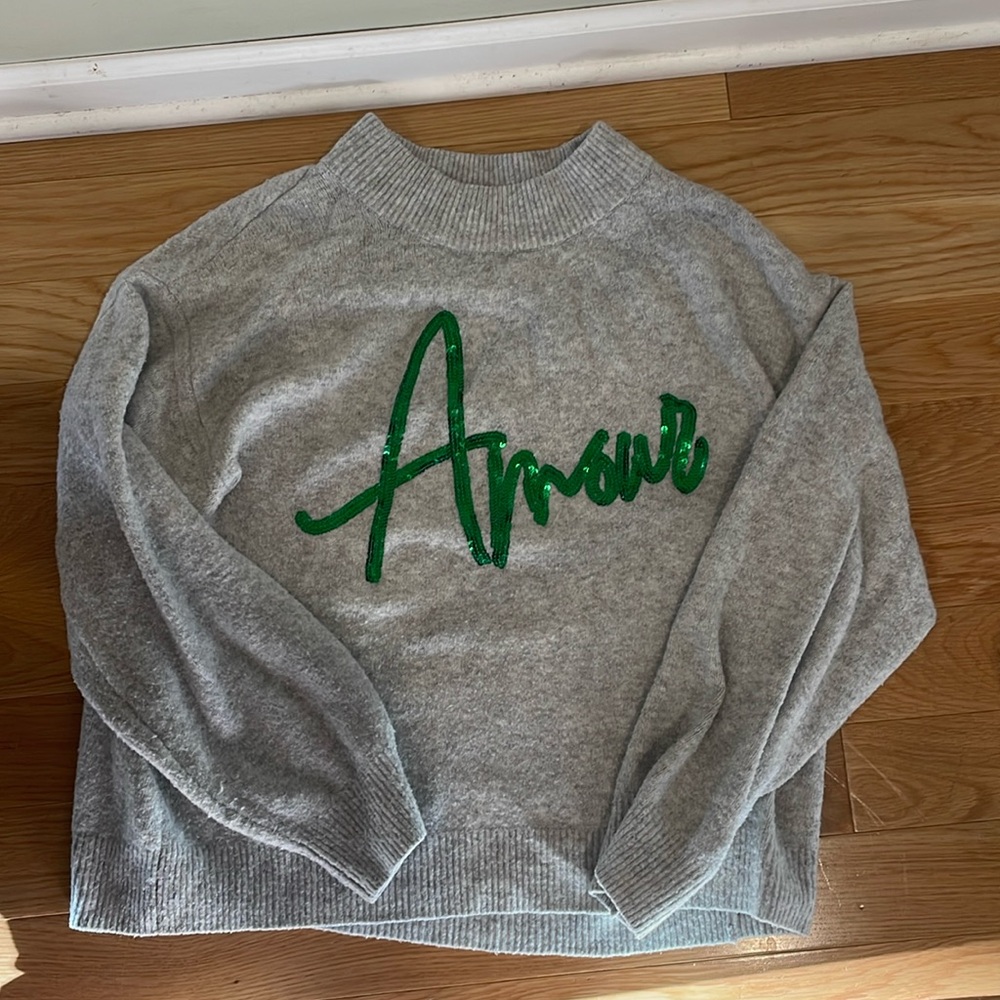 A new day gray sweater with sequin Amour on it
